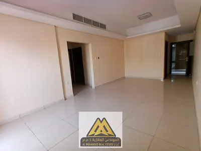 Annual rental 2-bedroom apartment in Al Mowaihat 3, Ajman. Balcony, 2 bathrooms, central AC, free maintenance, new family building, close to all servi