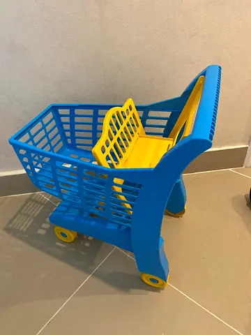 Blue and Yellow Toy Shopping Cart