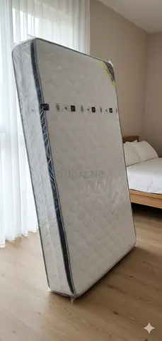 King size mattress (new, still in plastic) - brand new