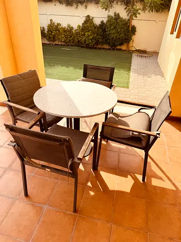Out door stone top table and chairs
