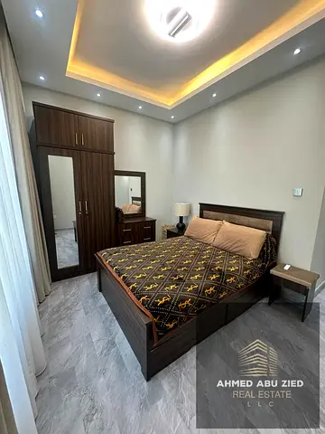 Two-bedroom apartment with a living room, unfurnished, for annual rent in Garden City, Al Hamidiya, Ajman. Two bathrooms, excellent location, suitable