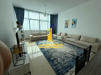 Sea view. Luxurious two-bedroom apartment with a living room and balcony offering an open view. Ajman Corniche. for monthly rent.