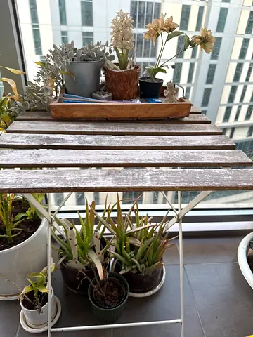 Small weathered but charming and rustic wooden balcony table with two matching chairs (set)