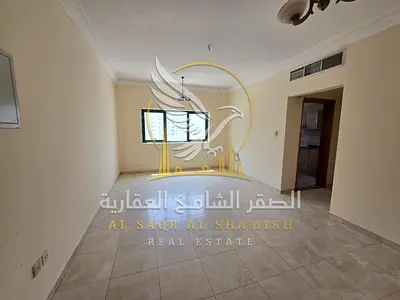 A spacious one bedroom apartment in Abu Shagara featuring central air conditioning good ventilation and ample natural light Ideal for families