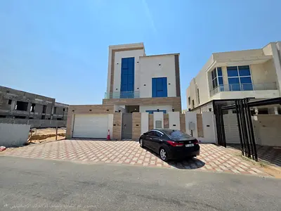 For rent in Al Bahia: a 3-story villa featuring 6 master bedrooms, a living room, a majlis, and a maid's room, along with a main kitchen and a prep ki