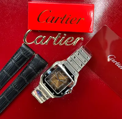 This is a Cartier Santos de Cartier watch featuring a distinctive gradient brown dial.