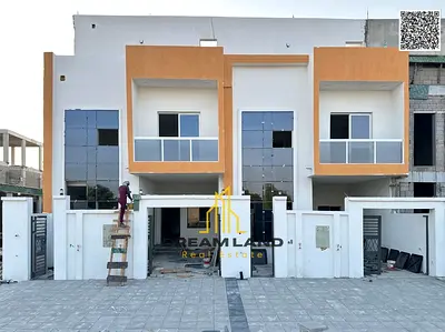 فيلا طابقين وروف بسعر شامل رسوم التسجيل والتميلك على الشارع الرئيسي جاهزة للسكن في أرقى مناطق عجمان تملك حر
