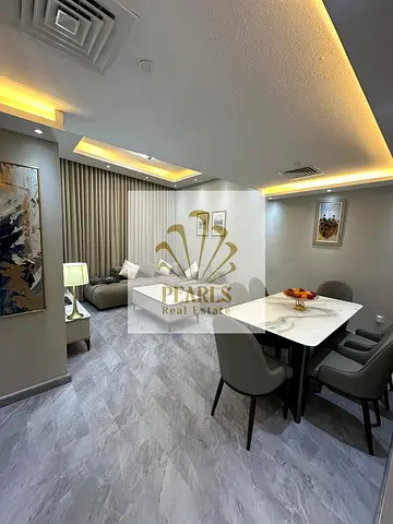 Annual Rent in Garden City Towers: 2BR Apartment with Hall and 2 Bathrooms for AED 40K on 4 Payments with Cheque Deposit