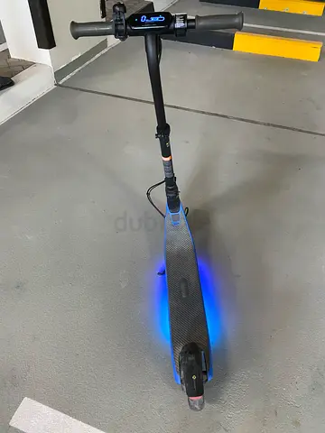 Electric kids scooter with LED deck lights, speaker, connected app - good condition