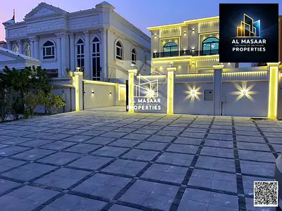 Villa for sale in Al Muwaihat, residential/commercial use, with a 20-meter front setback. Strategic