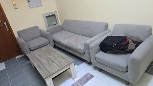 Light grey 3-seater sofa with two matching armchairs and coffee table