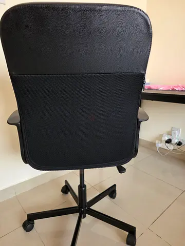Black ergonomic office chair with wheels - good condition