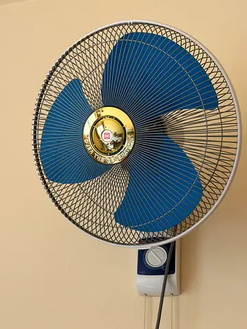 Wall-mounted electric fan - good working condition