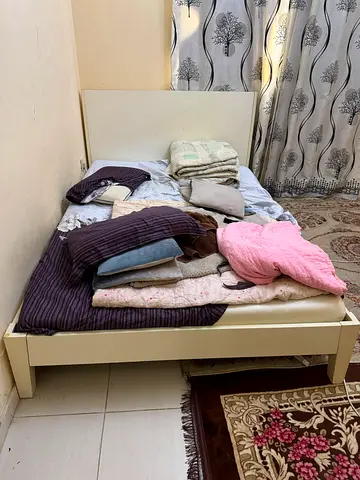 Queen size bed with mattress 50 location sharjah