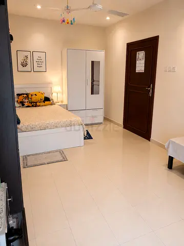 Fully furnished huge room with balcony available for rent at Muhaisnah 4