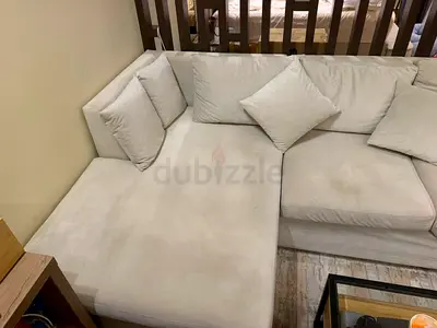 Light beige L-shaped sectional sofa - good condition