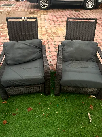 Set of 2 outdoor rattan lounge and recliners chairs with cushions — good used condition