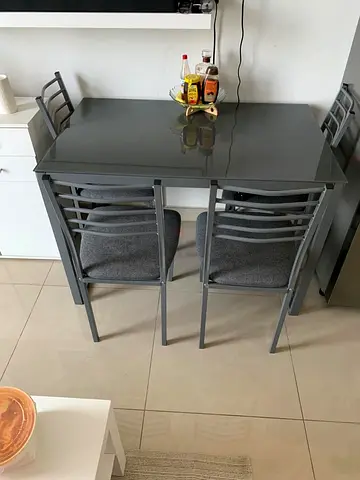 4 seater dining metal table (glass top)
