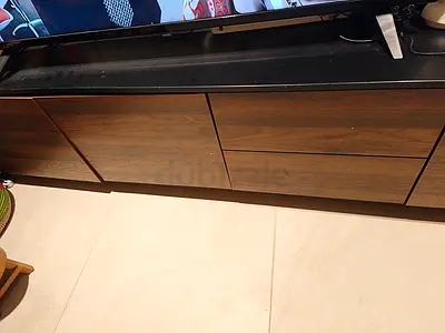 Long low wooden TV cabinet / media console - dark wood finish