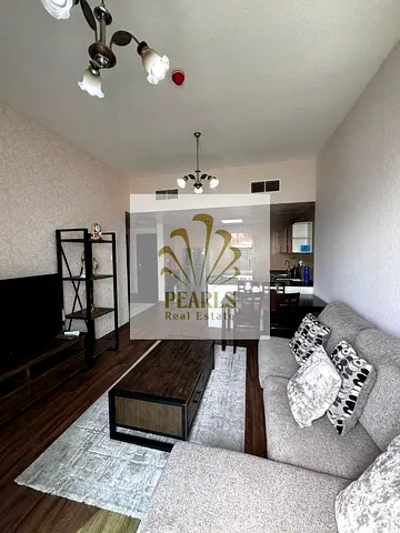 For annual rent: a luxurious one-bedroom apartment with a fully furnished living room and bedroom. The furniture is very elegant and high-end. It feat