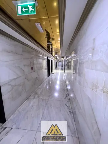 A spacious 1-bedroom apartment with a living room is available for annual rent in Al Rawd