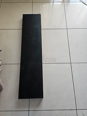 Long black wall-mounted TV shelf / floating media shelf