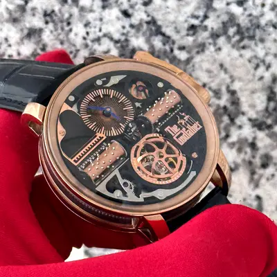 This Jacob & Co. Opera Godfather watch features a rose gold case and a mechanical music box movement