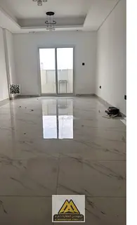 Annual Rent: Spacious 1-bedroom apartment in Al Muweihat 3, master room, 2 bathrooms, balcony, secon