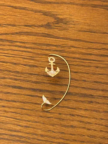 Gold anchor earring with pavé detail – gently used