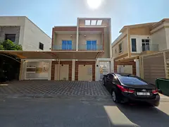 Villa for rent in the Al-Yasmeen area, featuring 5 master bedrooms, a majlis, a living room, and a m