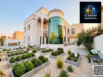 Luxury villa for sale in Al Yasmin, opposite the mosque and behind Al Hamidiya Park | Central air c