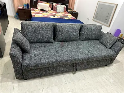 Stylish 3-Seater Convertible Sofa Bed
Upgrade your living space with this elegant sofa bed featuring