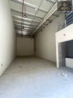 FRONT-SIDE BRAND NEW WAREHOUSE | HUGE PARKING | AL JURF | 1,000 SQFT | 15 KW POWER