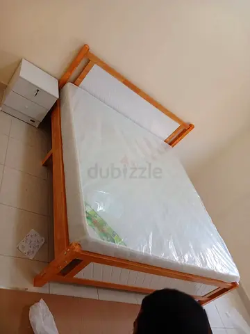 Brand new Solid.wood King size bed With Mattress Available