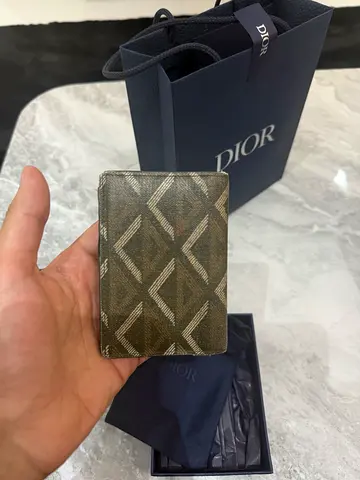 Orginal dior wallet,used, small wear and tear orginal price 1900