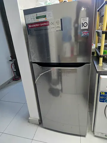 Used stainless steel top-freezer refrigerator - good working condition