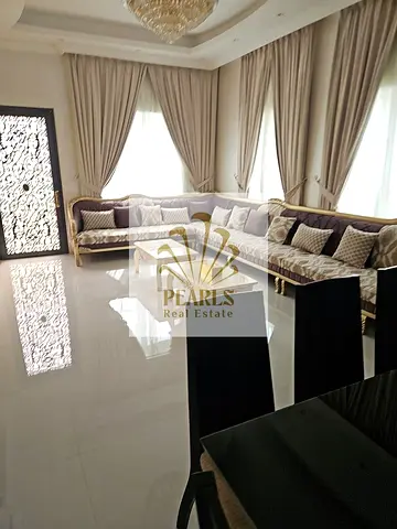 Luxury furnished 5 Bedroom villa for rent in Al Yasmeen. 7 bathrooms, majlis, spacious living room, ready to move in, AED 120,000/year, 4 payments.