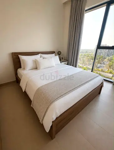 Wooden bedframe with mattress - perfect condition.