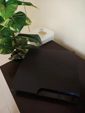 Ps3 slim midnight black with 2 controllers including sega superstar tennis