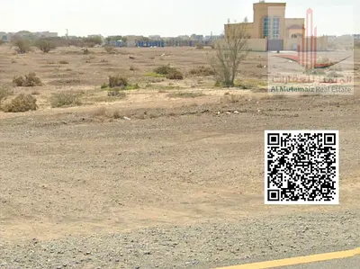 Land for sale in Manama, very large area and prime location.