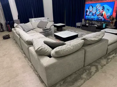7 piece pan Emirates Pianca corner feather filled sofa with footstool