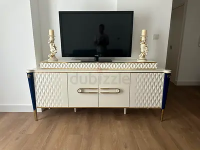 Modern white and gold TV table