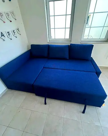 Blue L-Shaped Sofa Bed with Pull Out Function