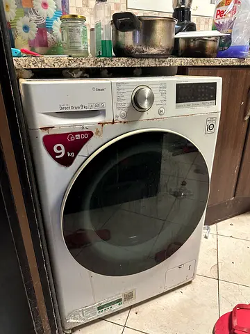 LG 9g Ai washing machine and Fridge hitachi 400 Dhs