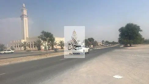 For saledirect owner residential commercial G+4 land Near important street of umm Al Quwain,