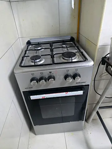 Stainless Steel 4-Burner Gas Cooker with Oven - Good Condition