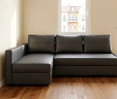 Upgrade your living room with this stylish L-Shape Sofa Bed with Storage. Available in leather and f