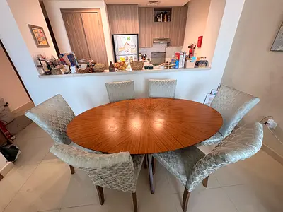 Round Wooden Dining Table with 6 newly Upholstered Chairs - Good Condition