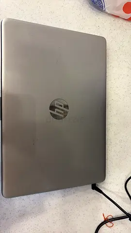 HP Silver Laptop - Good Working Condition. Free Samsung phone and fastrack watch