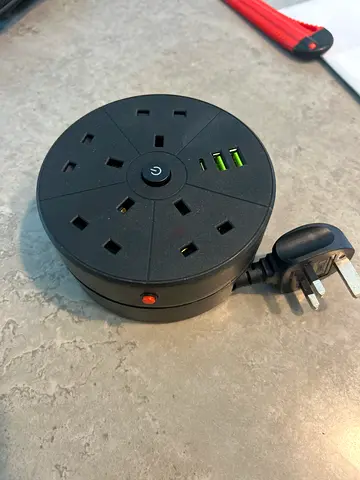 Compact UK Power Strip with 3 USB Ports and 4 Outlets - Good Condition